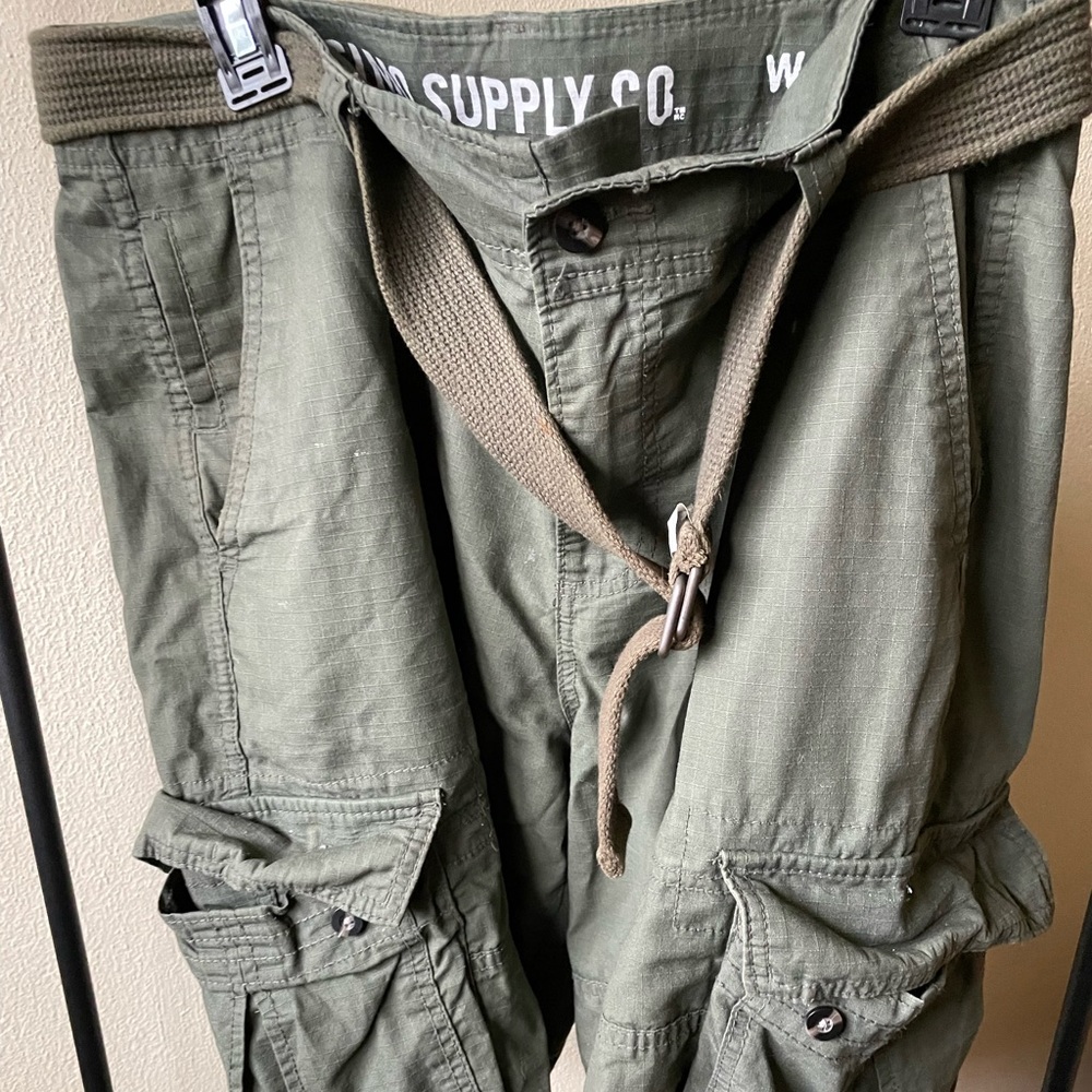 Men green cargo shorts with tan belt